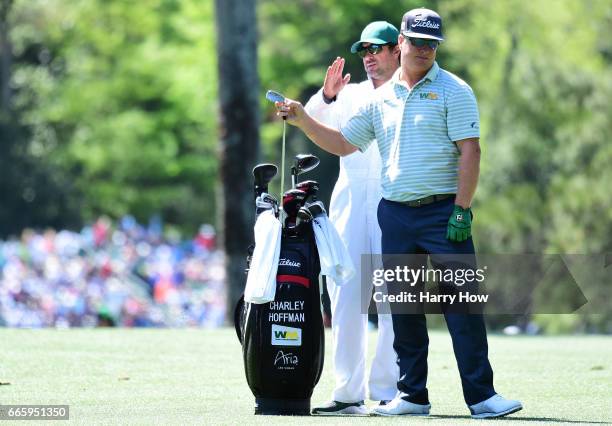 Charley Hoffman of the United States prepares to play a shot on the 17th hole as caddie Brett Waldman during the second round of the 2017 Masters...