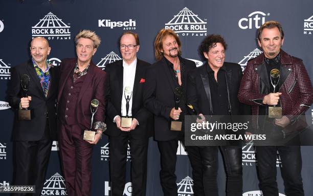 Members of the band Journey pose at the 31st Annual Rock And Roll Hall of Fame Induction Ceremony at Barclays Center on April 7, 2017 in New York...