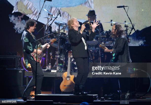 Inductees Trevor Rabin, Alan White, and Jon Anderson of Yes and 2013 Inductees Alex Lifeson and Geddy Lee of Rush onstage at the 32nd Annual Rock &...