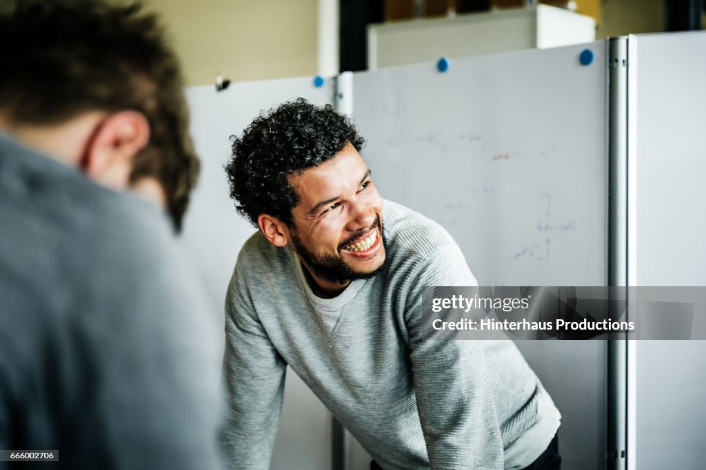 Portrait of casual businessman during meeting