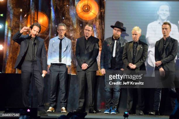 Inductees Eddie Vedder, Dave Krusen, Stone Gossard, Jeff Ament, Mike McCready and Matt Cameron of Pearl Jam speak onstage at the 32nd Annual Rock &...