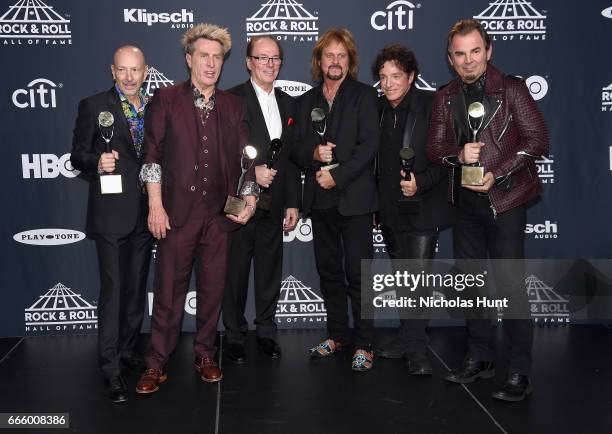 Inductees Steve Smith, Ross Valory, Aynsley Dunbar, Gregg Rolie, Neal Schon, and Jonathan Cain of Journey attend the Press Room of the 32nd Annual...