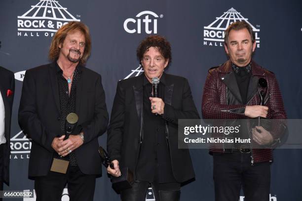 Inductees Gregg Rolie, Neal Schon, Jonathan Cain of Journey attend the Press Room of the 32nd Annual Rock & Roll Hall Of Fame Induction Ceremony at...
