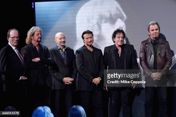 Aynsley Dunbar, Gregg Rolie, Steve Smith, Steve Perry, Neal Schon and Jonathan Cain of Journey accept an award onstage at the 32nd Annual Rock & Roll...