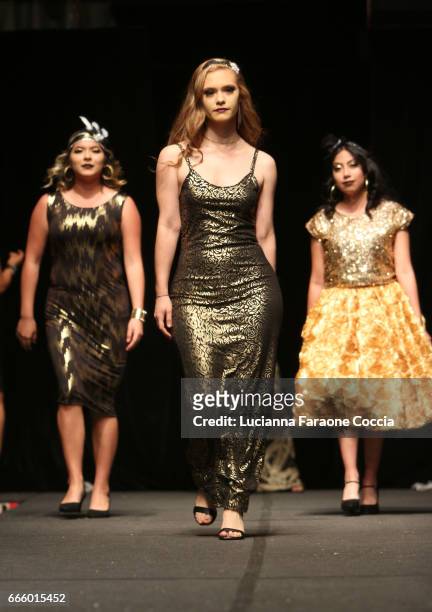 Model walks the runway at Santee High School Fashion Show at Los Angeles Trade Technical College on April 7, 2017 in Los Angeles, California.