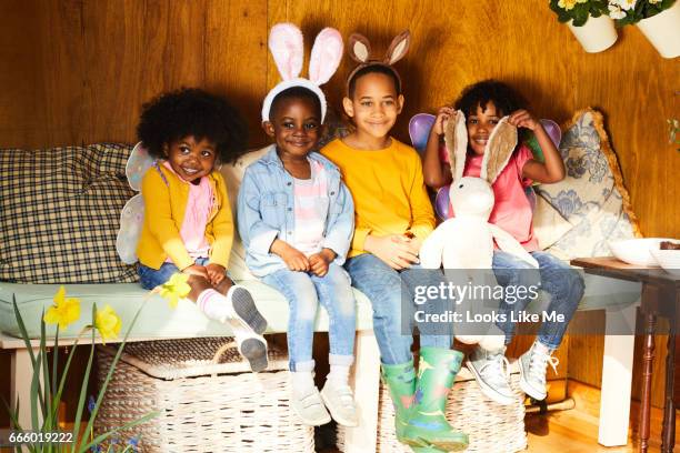 children having easter fun. - eastersowhite stock-fotos und bilder