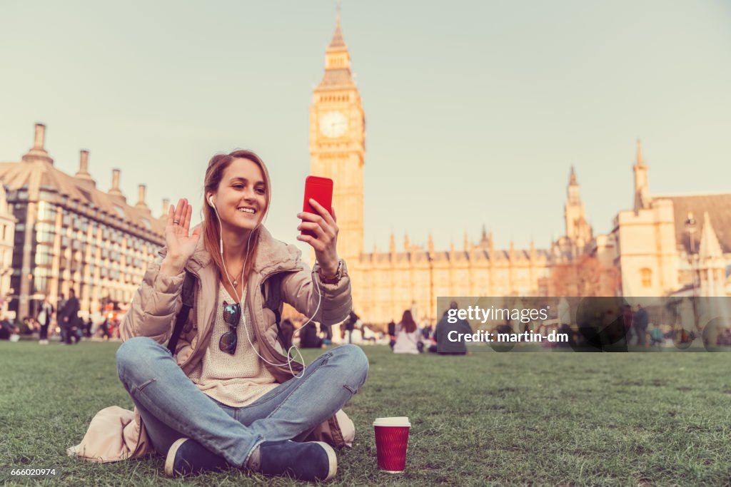 Saying hi on video call from London