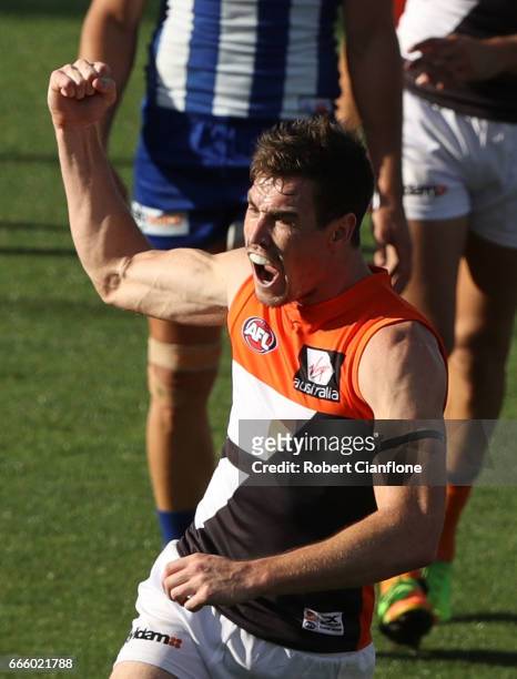 Jeremy Cameron of the Giants celebrates after scoring a goal during the round three AFL match between the North Melbourne Kangaroos and the Greater...