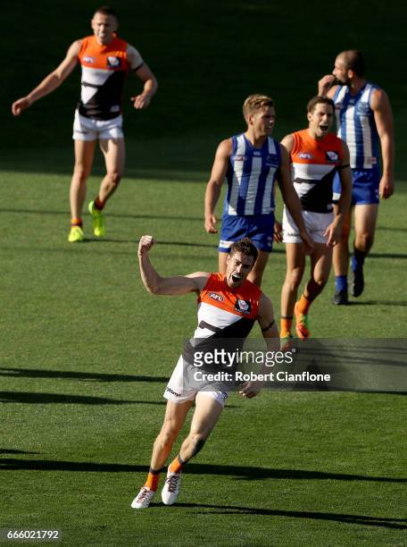 Jeremy Cameron of the Giants celebrates after scoring a goal during the round three AFL match between the North Melbourne Kangaroos and the Greater...