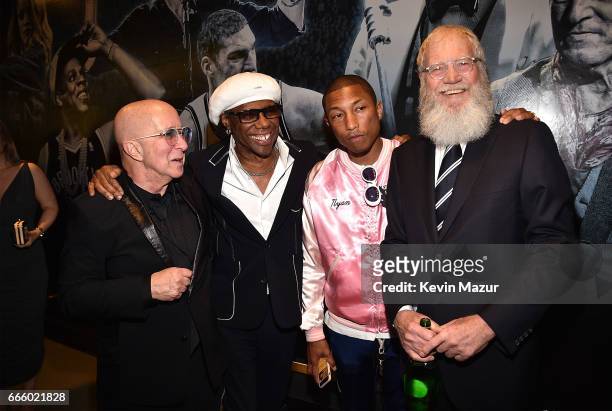 Paul Shaffer, Inductee Nile Rodgers, and presenters Pharrell Williams, and David Letterman attends 32nd Annual Rock & Roll Hall Of Fame Induction...