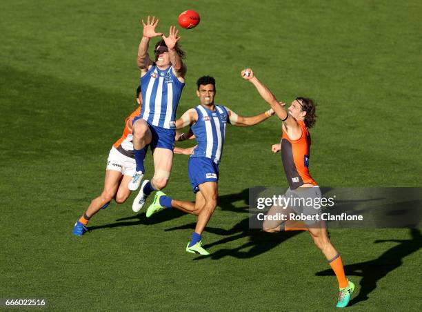 Ben Brown of the Kangaroos attempt to mark during the round three AFL match between the North Melbourne Kangaroos and the Greater Western Sydney...
