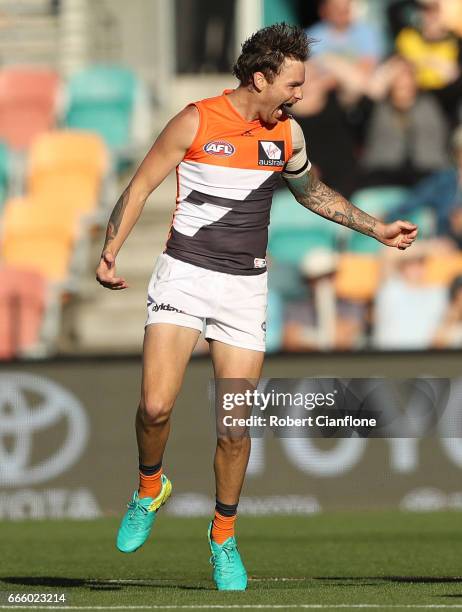 Nathan Wilson of the Giants celebrates after scoring a goal during the round three AFL match between the North Melbourne Kangaroos and the Greater...