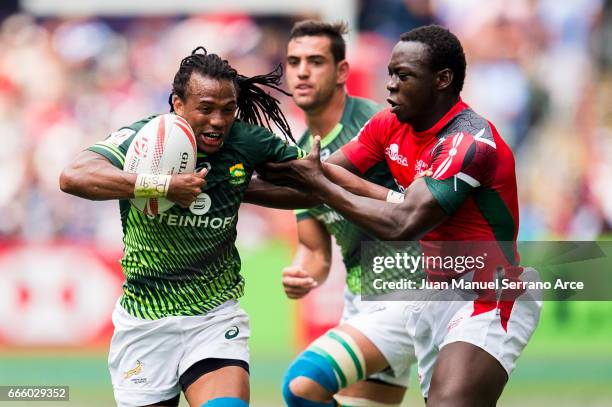 Cecil Afrika of South Africa is tackled during the 2017 Hong Kong Sevens match between South Africa and Kenya at Hong Kong Stadium on April 8, 2017...