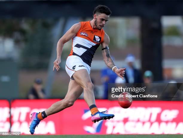 Zac Williams of the Giants kicks the ball during the round three AFL match between the North Melbourne Kangaroos and the Greater Western Sydney...