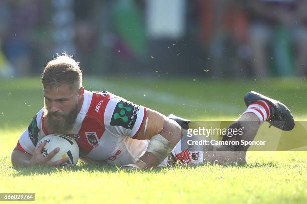 Jack De Belin of the Dragons scores a try during the round six NRL match between the Manly Sea Eagles and the St George Illawarra Dragons at...