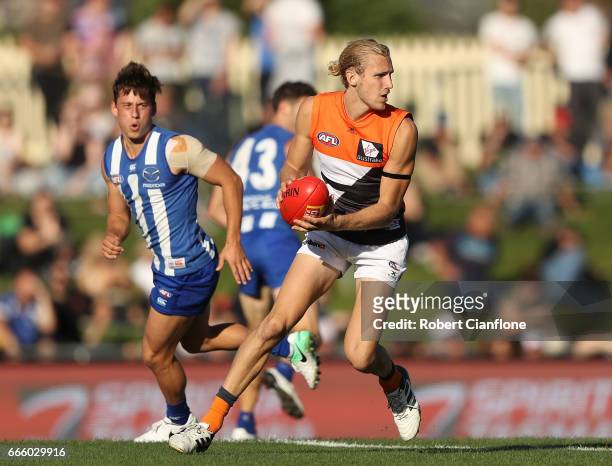 Nick Haynes of the Giants runs with the ball during the round three AFL match between the North Melbourne Kangaroos and the Greater Western Sydney...