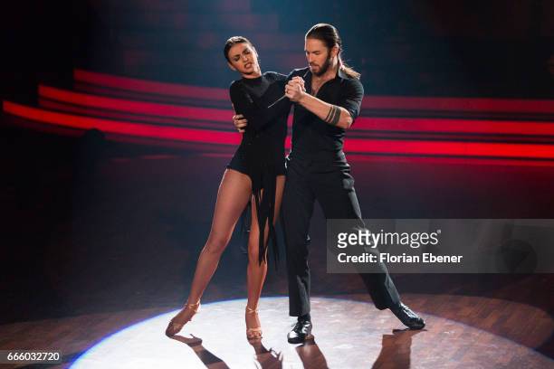 Gil Ofarim and Ekaterina Leonova perform on stage during the 4th show of the tenth season of the television competition 'Let's Dance' on April 7,...