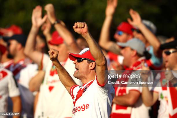 Dragons fans celebrate a try during the round six NRL match between the Manly Sea Eagles and the St George Illawarra Dragons at Lottoland on April 8,...