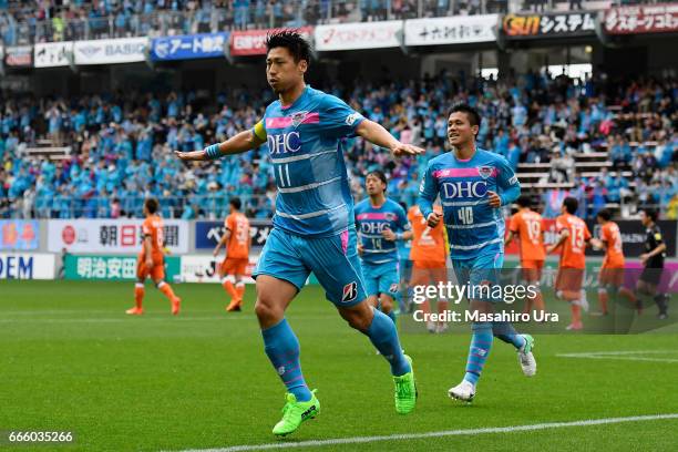 Yohei Toyoda of Sagan Tosu celebrates scoring the opening goal from the penalty spot during the J.League J1 match between Sagan Tosu and Albirex...