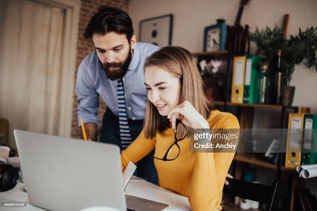 Beautiful people working together in the office