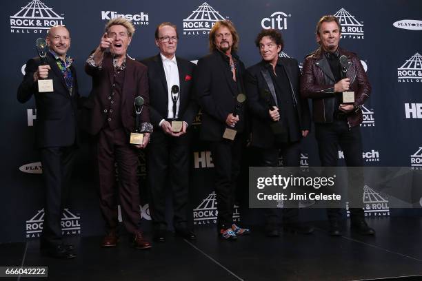 Inductees Steve Smith, Ross Valory, Aynsley Dunbar, Gregg Rolie, Neal Schon, and Jonathan Cain of Journey attend the 32nd Annual Rock & Roll Hall Of...