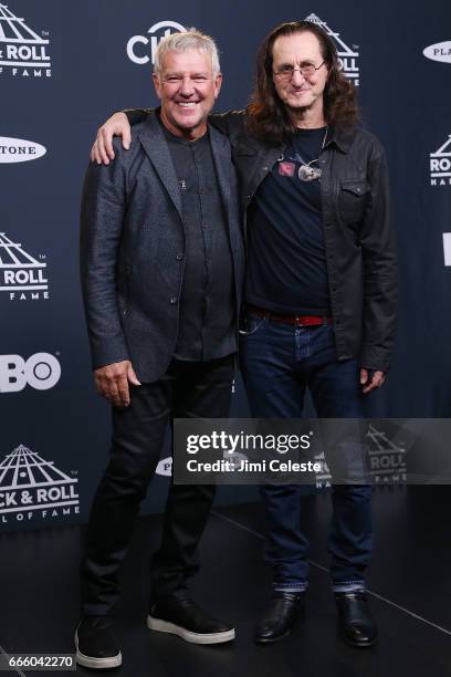 Alex Lifeson and Geddy Lee of Rush attend the 32nd Annual Rock & Roll Hall Of Fame Induction Ceremony at Barclays Center on April 7, 2017 in New York...