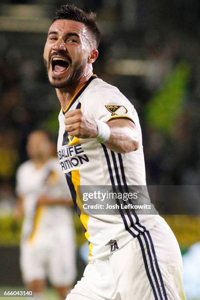 Romain Alessandrini of the Los Angeles Galaxy reacts after teammate Jermaine Jones scores during the Los Angeles Galaxy's MLS match against Montreal...