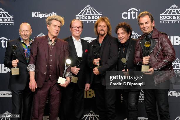 Inductees Steve Smith, Ross Valory, Aynsley Dunbar, Gregg Rolie, Neal Schon, and Jonathan Cain of Journey attend the Press Room of the 32nd Annual...