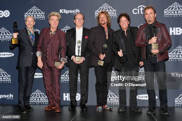 Inductees Steve Smith, Ross Valory, Aynsley Dunbar, Gregg Rolie, Neal Schon, and Jonathan Cain of Journey attend the Press Room of the 32nd Annual...