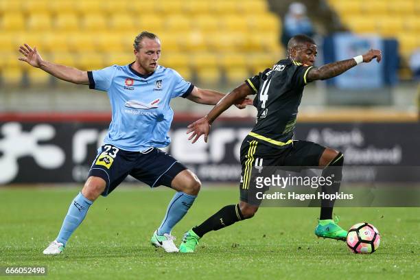 Roly Bonevacia of the Phoenix and Rhyan Grant of Sydney FC during the round 26 A-League match between the Wellington Phoenix and Sydney FC at Westpac...