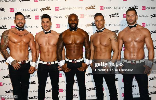 Actor/model Tyson Beckford poses for photos with the cast of Chippendales, as he begins a celebrity guest host in residency with the Chippendales at...