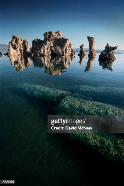 The famed "Tufa" formations of Mono Lake, near Lee Vining, CA, will slowly be re-submerged into the briny water where they were formed by an...