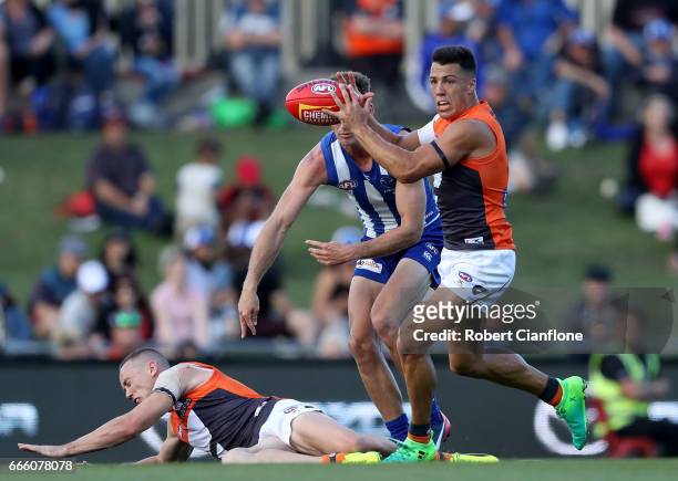 Dylan Shiel of the Giants takes the ball during the round three AFL match between the North Melbourne Kangaroos and the Greater Western Sydney Giants...