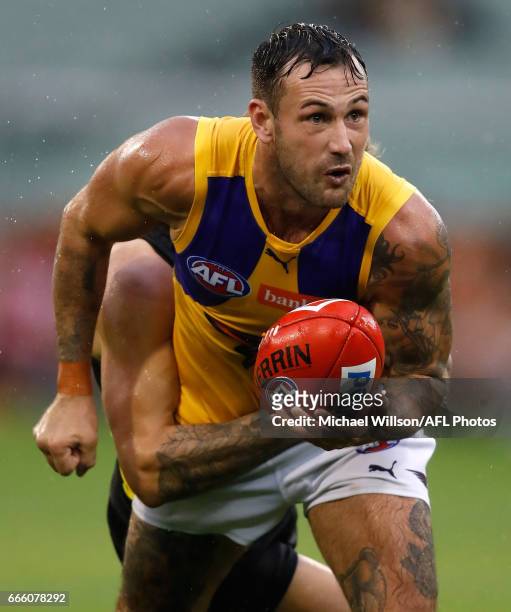 Chris Masten of the Eagles is tackled during the 2017 AFL round 03 match between the Richmond Tigers and the West Coast Eagles at the Melbourne...