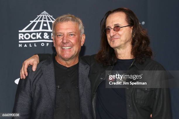 Musicians Alex Lifeson and Geddy Lee attend the Press Room of the 32nd Annual Rock & Roll Hall Of Fame Induction Ceremony at Barclays Center on April...