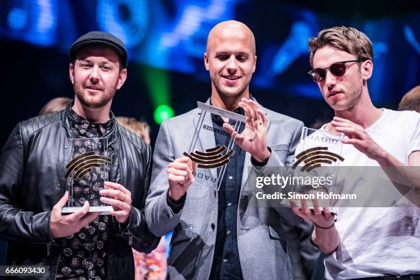 Matt Simons, Milow and Clueso pose with their awards during the Radio Regenbogen Award 2017 at Europapark on April 7, 2017 in Rust, Germany.