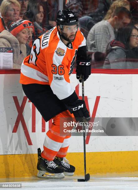 Colin McDonald of the Philadelphia Flyers skates the puck against the New Jersey Devils on April 1, 2017 at the Wells Fargo Center in Philadelphia,...