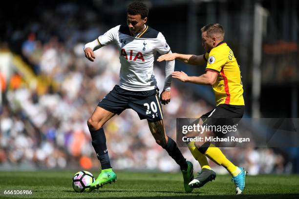 Dele Alli of Tottenham Hotspur and Tom Cleverley of Watford battle for possession during the Premier League match between Tottenham Hotspur and...