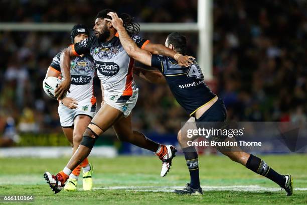 Jamal Idris of the Tigers runs the ball during the round six NRL match between the North Queensland Cowboys and the Wests Tigers at 1300SMILES...