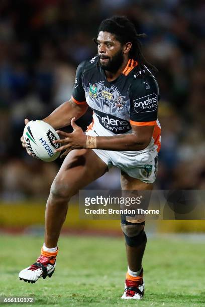 Jamal Idris of the Tigers runs the ball during the round six NRL match between the North Queensland Cowboys and the Wests Tigers at 1300SMILES...