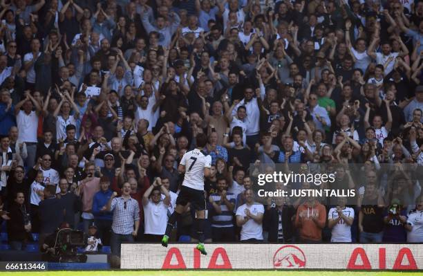 Tottenham Hotspur's South Korean striker Son Heung-Min celebrates scoring his team's third goal during the English Premier League football match...