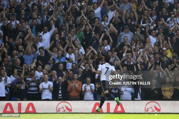 Tottenham Hotspur's South Korean striker Son Heung-Min celebrates scoring his team's third goal during the English Premier League football match...