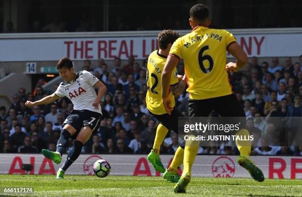 Tottenham Hotspur's South Korean striker Son Heung-Min scores his team's fourth, and his second goal during the English Premier League football match...