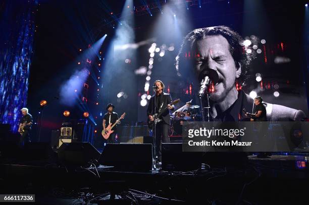 Inductees Mike McCready, Matt Cameron, Jeff Ament and Eddie Vedder of Pearl Jam perform onstage during the 32nd Annual Rock & Roll Hall Of Fame...