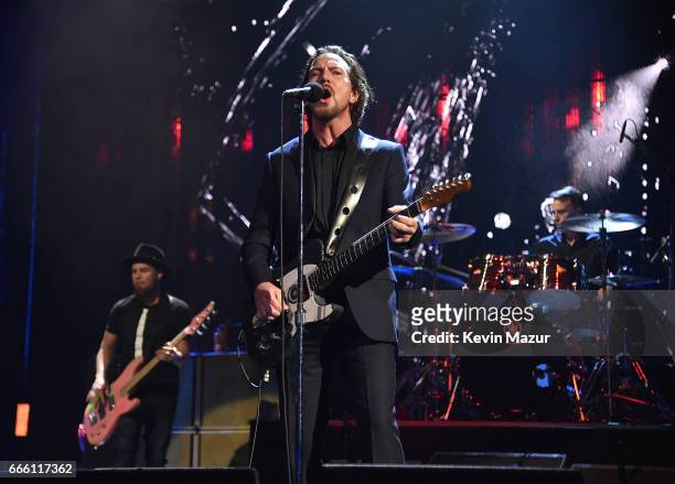 Inductees Mike McCready, Matt Cameron, Jeff Ament and Eddie Vedder of Pearl Jam perform onstage during the 32nd Annual Rock & Roll Hall Of Fame...