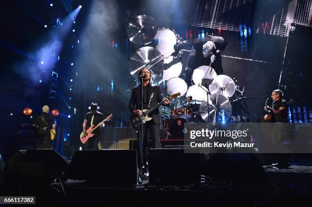 Inductees Mike McCready, Matt Cameron, Jeff Ament and Eddie Vedder of Pearl Jam perform onstage during the 32nd Annual Rock & Roll Hall Of Fame...