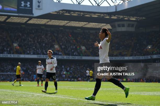 Tottenham Hotspur's South Korean striker Son Heung-Min celebrates scoring his team's fourth goal, and his second goal during the English Premier...