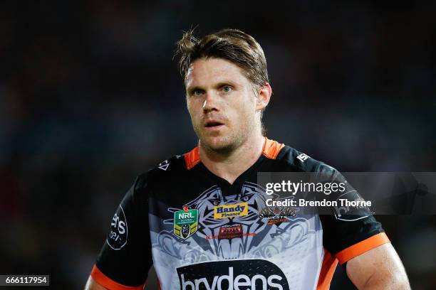 Christopher Lawrence of the Tigers looks on during the round six NRL match between the North Queensland Cowboys and the Wests Tigers at 1300SMILES...