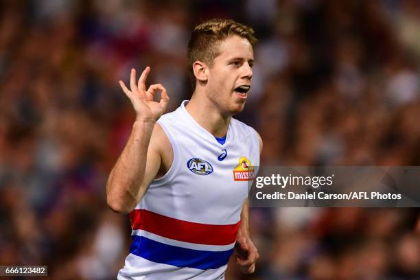 Lachie Hunter of the Bulldogs celebrates a goal during the 2017 AFL round 03 match between the Fremantle Dockers and the Western Bulldogs at Domain...