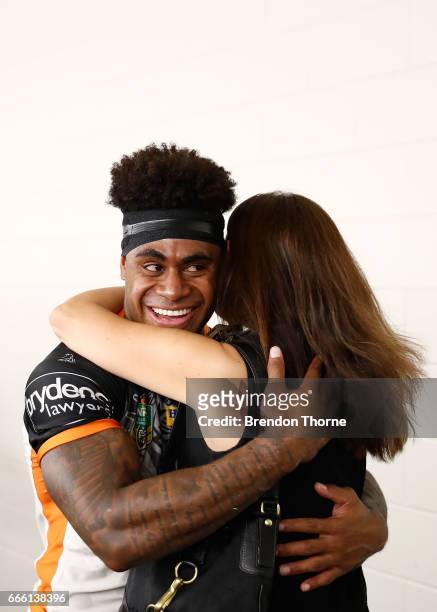 West Tigers Chairwomen, Marina Go hugs Kevin Naiqama of the Tigers following the round six NRL match between the North Queensland Cowboys and the...